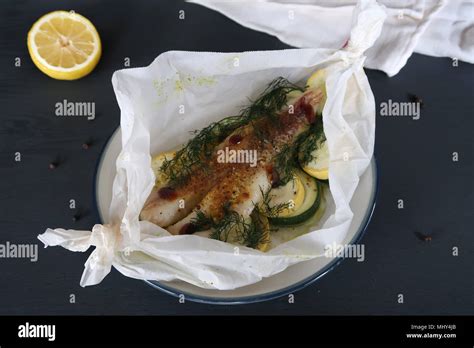 Fish En Papillote Fish Baked In Parchment Paper Stock Photo Alamy