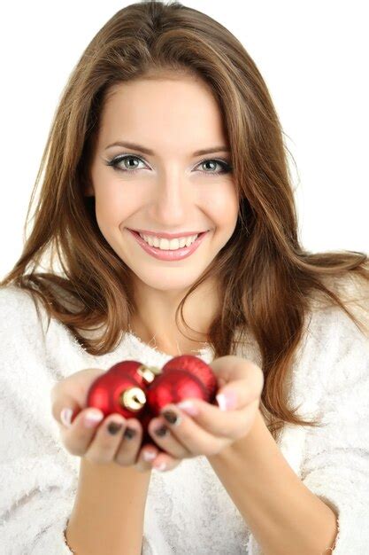 Hermosa Ni A Sonriente Con Juguetes De Navidad Aislado En Blanco Foto