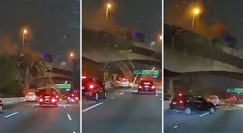 VÍDEO Caminhão bate em viaduto e carga de madeira cai sobre carros em SP