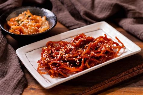 Premium Photo Seasoned Dried Shredded Squid Ojingeochae Muchim With