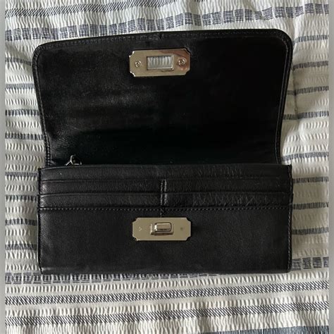 Black Coach Wallet With Twist Lock Gem