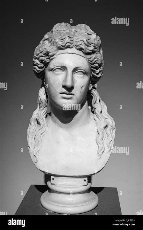 Black And White Photo Of Ancient Marble Bust Of Long Haired Roman Woman