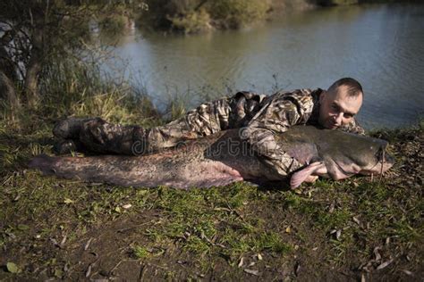 Fisherman Holding A Giant Catfish Stock Image Image Of Angler Fresh