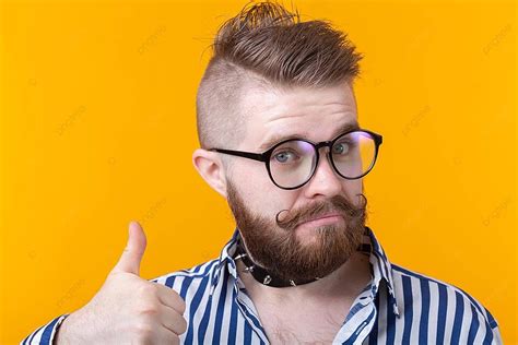 Hipster Gives Thumbs Up For Good Luck And Success Photo Background And