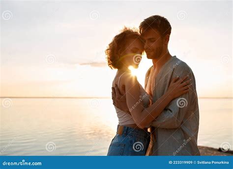 Sensual Young Caucasian Couple Embracing At Sunset Stock Image Image