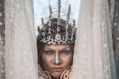 Premium Photo Close Up Of Woman With Face Paint Wearing Headwear