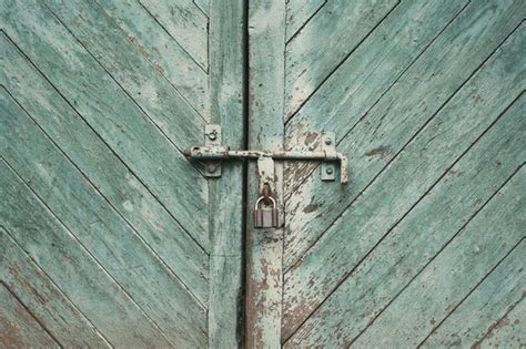 Premium Photo Old Metal Lock On A Wooden Door With Cracked Paint