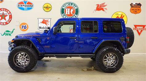 Total 97 Imagen Jeep Wrangler Blue Lifted Abzlocalmx