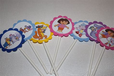 Dora The Explorer Cupcake Toppers 1700 Via Etsy Dora The