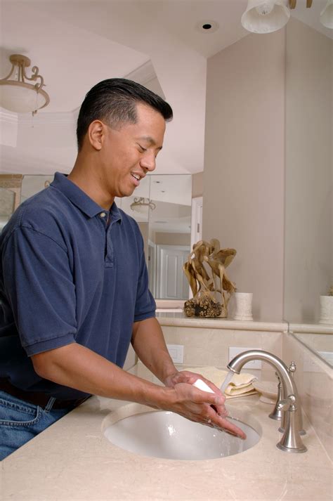 File:Man washing hands (1).jpg - Wikimedia Commons