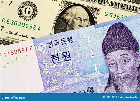 South Korean Won Note With American One Dollar Bill Stock Photo