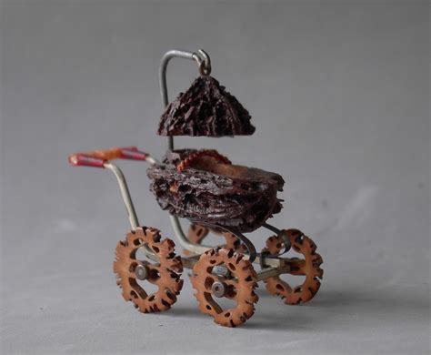 Anonymous Works: Folk Art Walnut Shell Baby Stroller