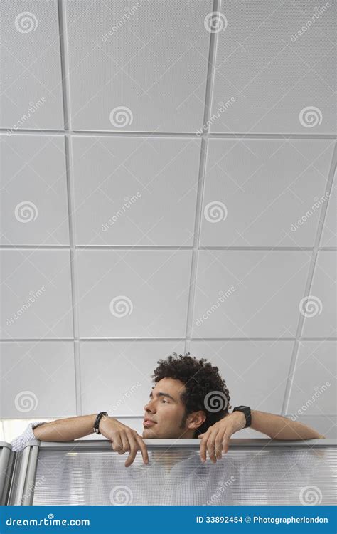 Office Worker Peering Over Cubicle Wall Stock Photo Image Of