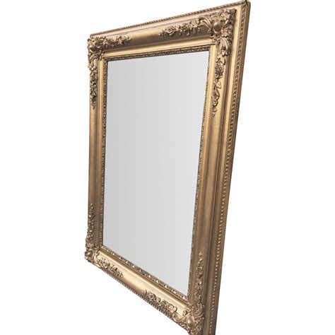 Miroir baroque vintage avec cadre en bois et stuc doré