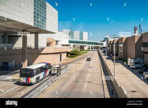 Bus Stands At A Bus Stop At George Bush Intercontinental Airport In