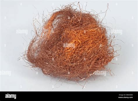 Copper, lathe turnings, studio picture Stock Photo - Alamy