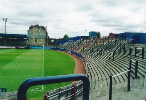 An Empty Soccer Stadium Filled With Lots Of Seats