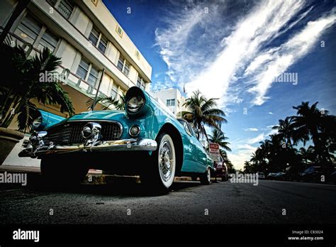 Low Angle Photo Of Classic Car On Ocean Drive Miami Beach Florida