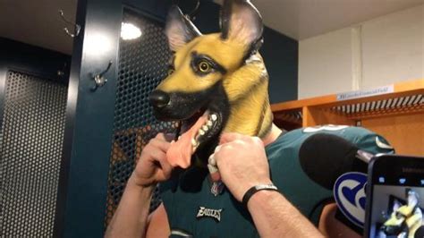 Embracing 'underdog' status, Eagles players wear dog masks after be ...