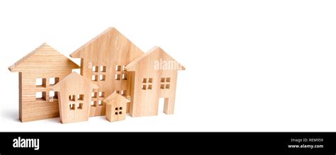 Architecture In The City And Town Miniature Wooden Houses On A White