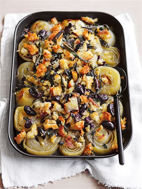 Slow Roasted Onion Tray Stuffing With Olives Sage And Oregano Donna Hay