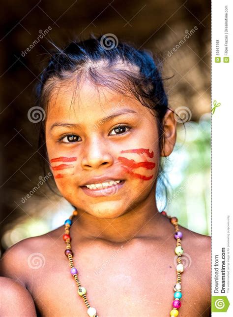 Native Brazilian Girl Smiling At An Indigenous Tribe In The Amazon