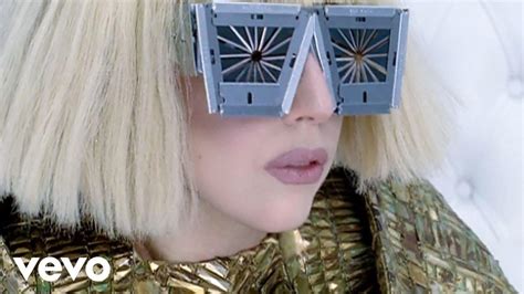 The White Sunglasses Carrera Worn By Lady Gaga In Her Music Video Bad