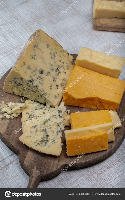 English Cheeses Collection Mature Coloured Cheddar Cheese Semi Soft Crumbly Stock Photo by ©foto ...