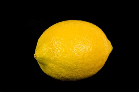 Premium Photo | Lemon on color background