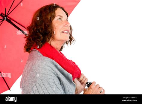 Thoughtful Mature Woman Holding Umbrella Stock Photo Alamy