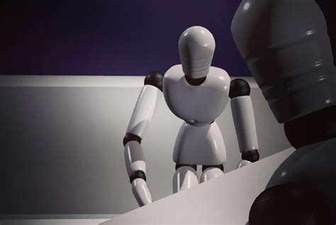 A White Robot Standing Next To A Black Object