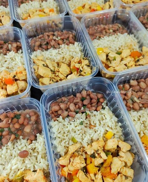 Several Plastic Containers Filled With Rice And Beans