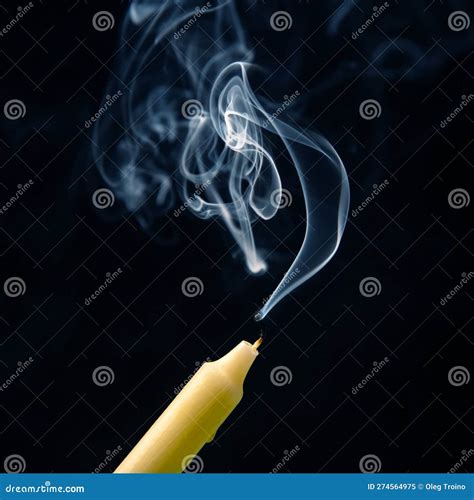 Smoke From An Extinguished Candle On A Dark Background The Concept Of