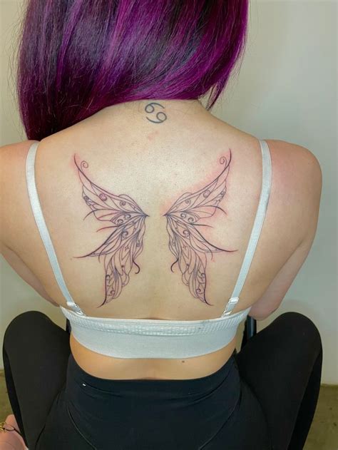 Fairy wings tattoo in 2023 | Fairy wing tattoos, Girly hand tattoos ...