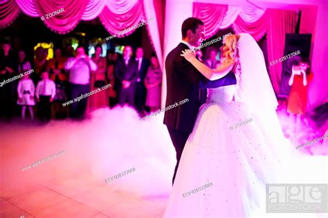 Amazing First Wedding Dance Of Newlyweds On Low Pink Light And Heavy