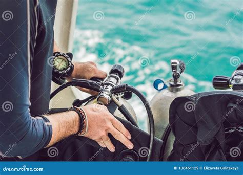 Diver Prepares His Equipment for Diving in the Sea Stock Image - Image of dive, nature: 136461129