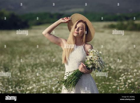 Beautiful Woman Enjoying Daisy Field Nice Female Lying Down In Meadow