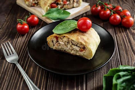 Homemade Strudel With Meat On A Wooden Background Stock Photo Image