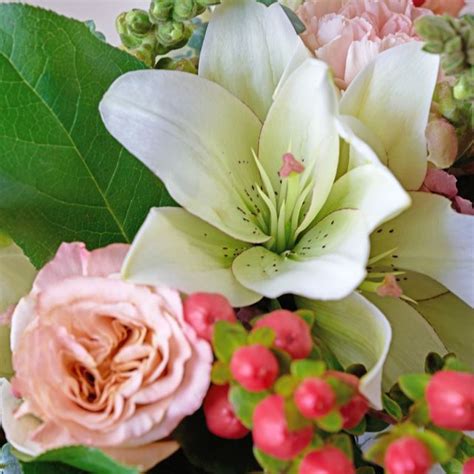 Peach Carnations, White Hybrids and Rose Arrangement - The Bouqs Co.