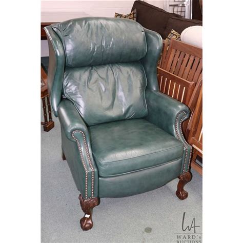 Green Leather Upholstered Chippendale Style Wing Back Recliner With Nail Head Decoration And