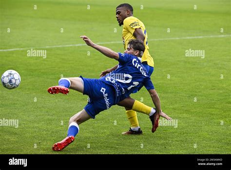 Westerlo S Lyle Foster And Gent S Robbie Van Hauter Pictured In Action