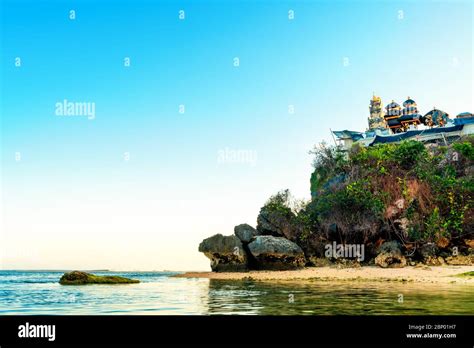 Balinese Hindu Temple On Top Of Mountain Cliff On Background Beautiful