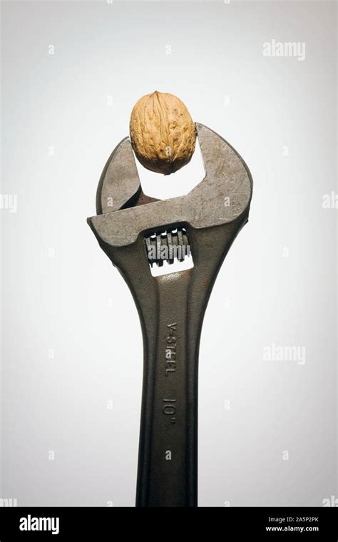 Wrench with nut Stock Photo - Alamy