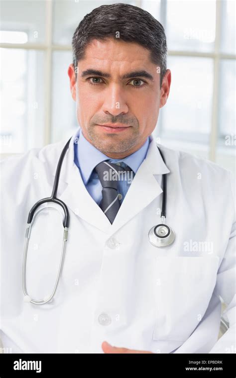 Portrait Of A Serious Male Doctor Stock Photo Alamy