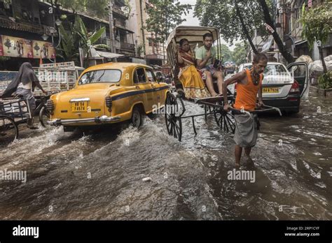 180626 KOLKATA June 26 2018 A Hand Rickshaw Puller Carries