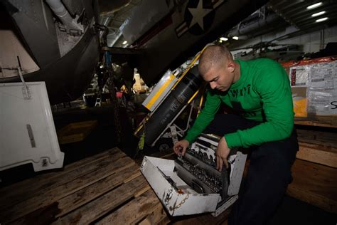 Dvids Images U S Navy Sailor Conducts Maintenance On An E C