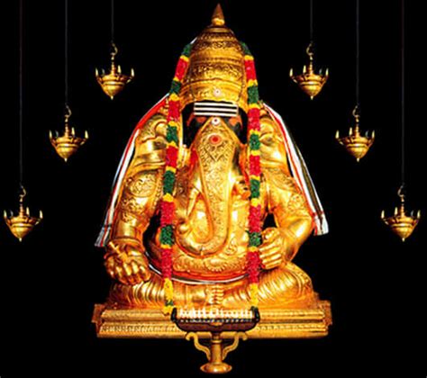 Download Golden Vinayagar Statue | Wallpapers.com