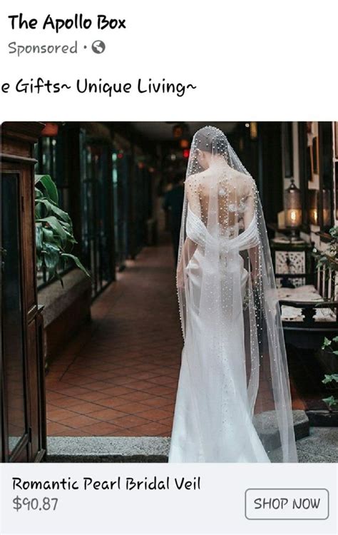 A Woman In A White Wedding Dress And Veil