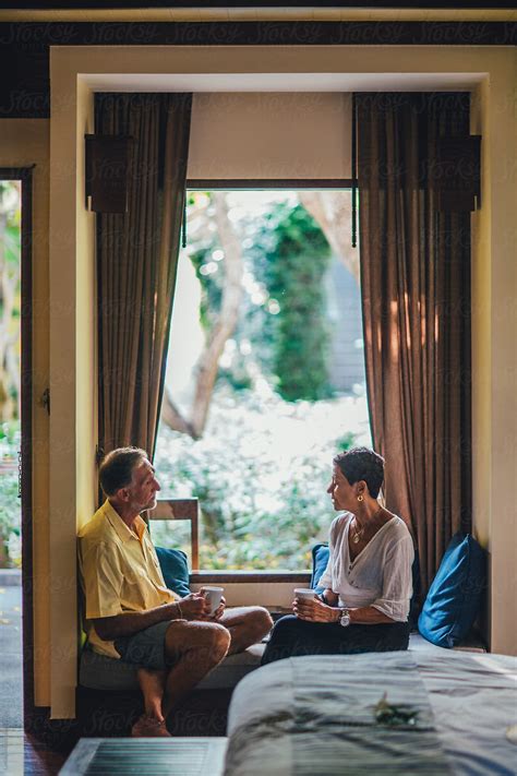 Mature Couple Relaxing At A Tropical Resort By Stocksy Contributor Lumina Stocksy