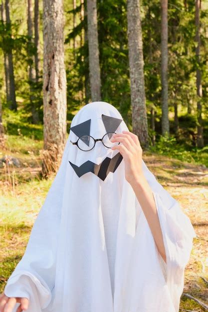 Premium Photo | Funny and scary ghost costume for halloween in the forest